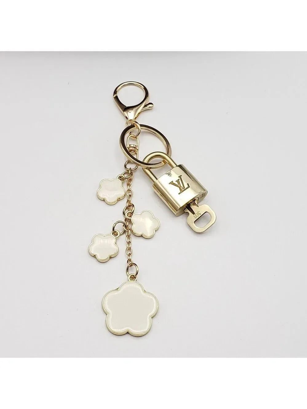 Authentic Louis Vuitton Lock & Key with Unbranded Flower Charm, Keychain